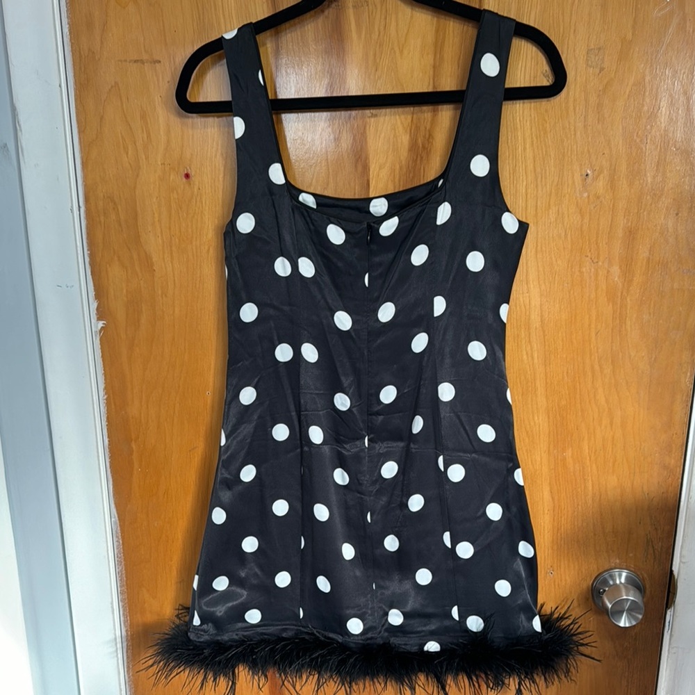 Chic Black Polka Dot Dress with Feather Trim - Picture 10 of 14